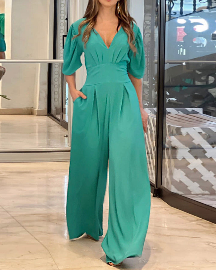 Jumpsuit met pofmouwen en V-hals