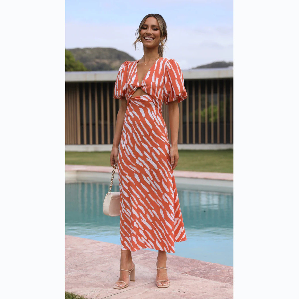 Vestido midi estampado com decote em V e linha A