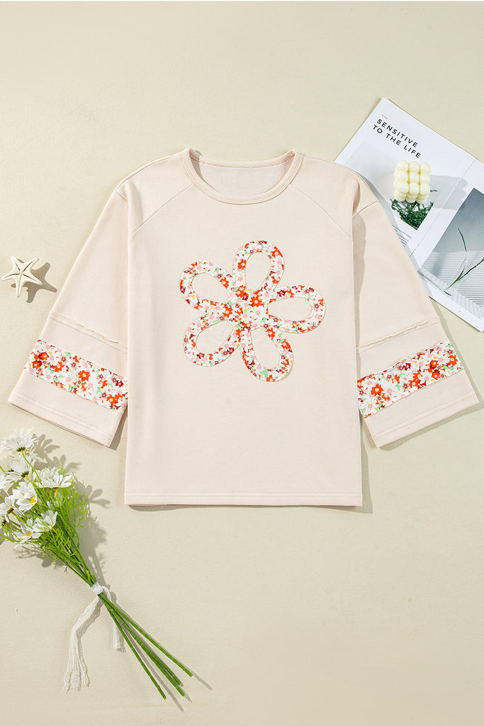 Sudadera con manga 3/4 y parche de flores recortada