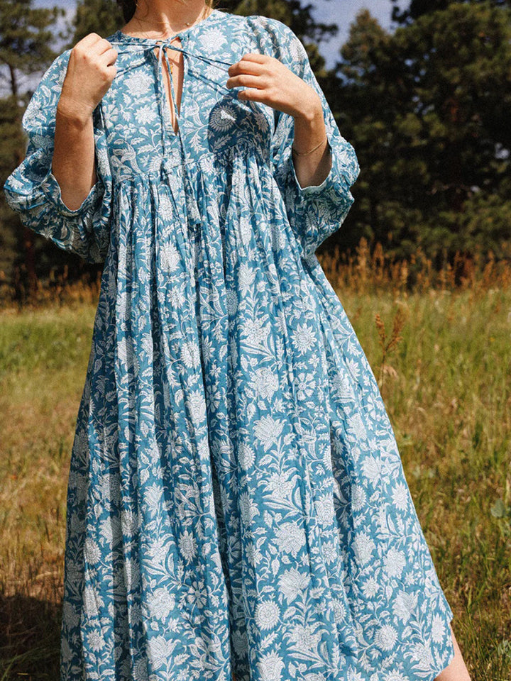 Vestido midi floral manga balão