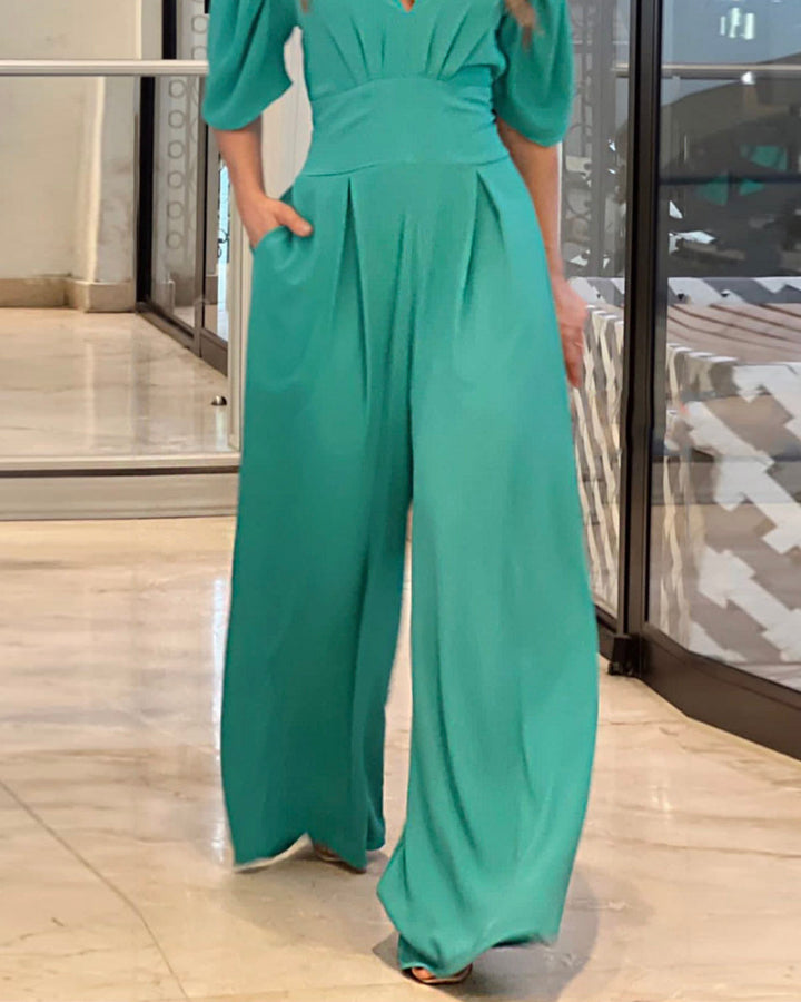 Jumpsuit met pofmouwen en V-hals